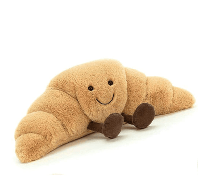 Suave peluche de pan en formas juguetonas para niños y adultos